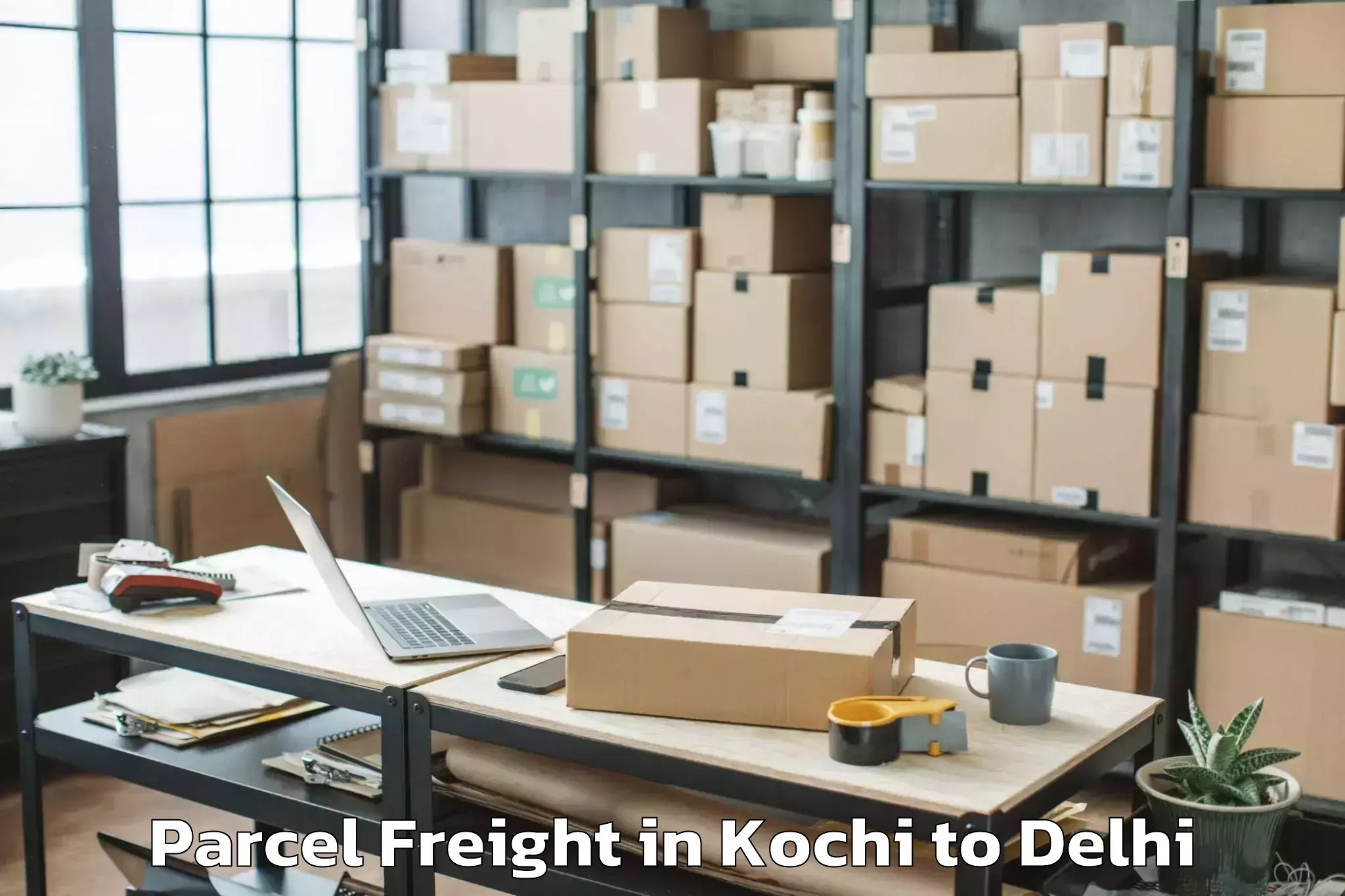 Book Kochi to V3s East Centre Mall Parcel Freight Online